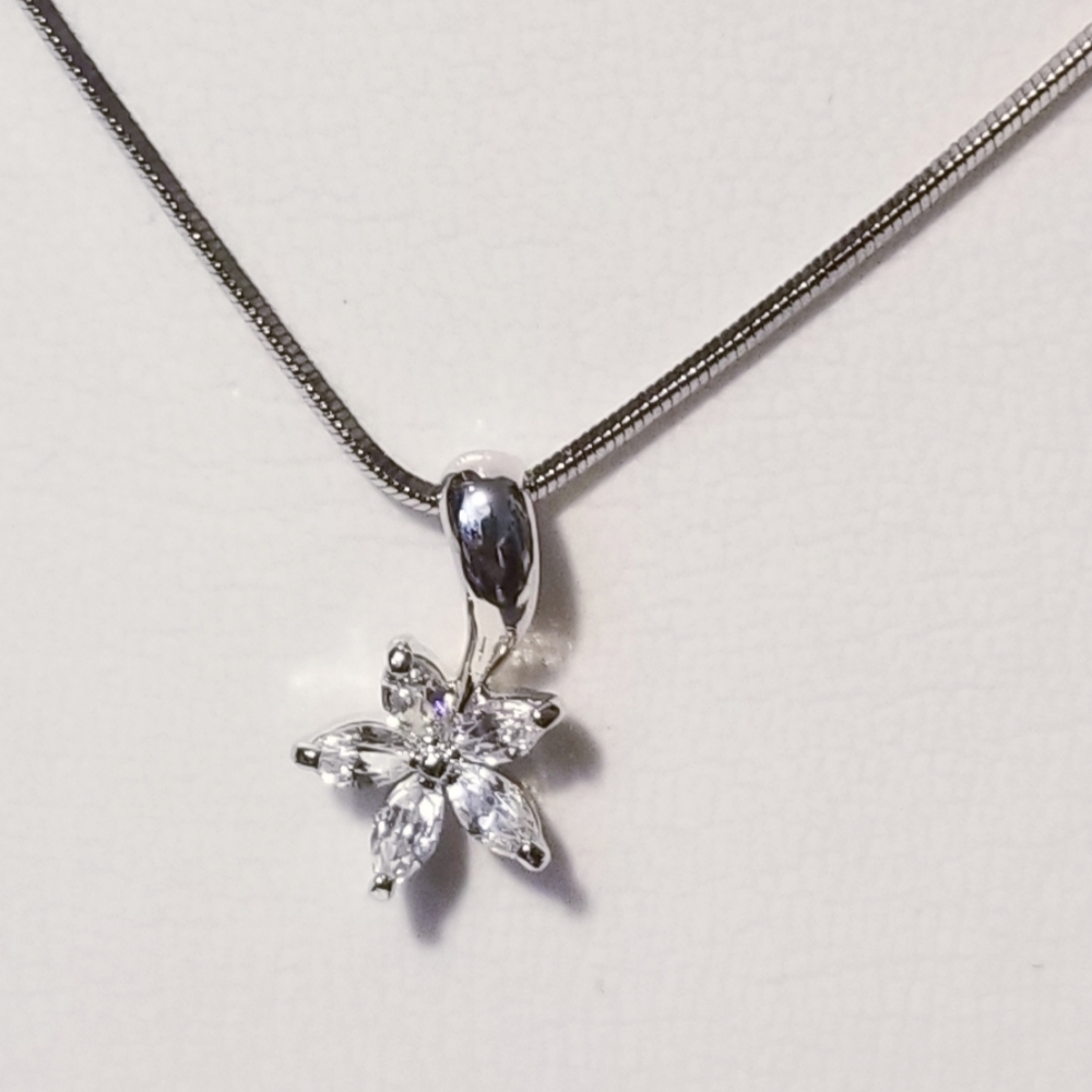 Crystal flower pendant w silver plated necklace